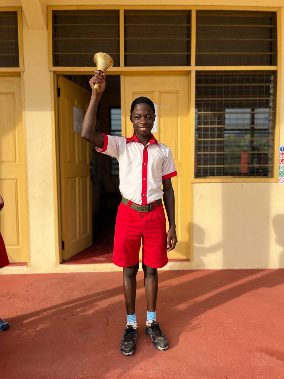 Bell Boy A bell boy ringing his bell